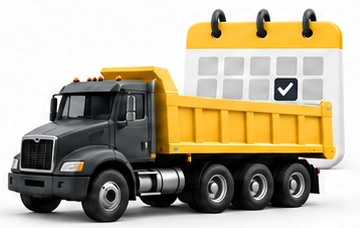 Scheduled Projects: graphite dump truck with yellow bed and three rear axles